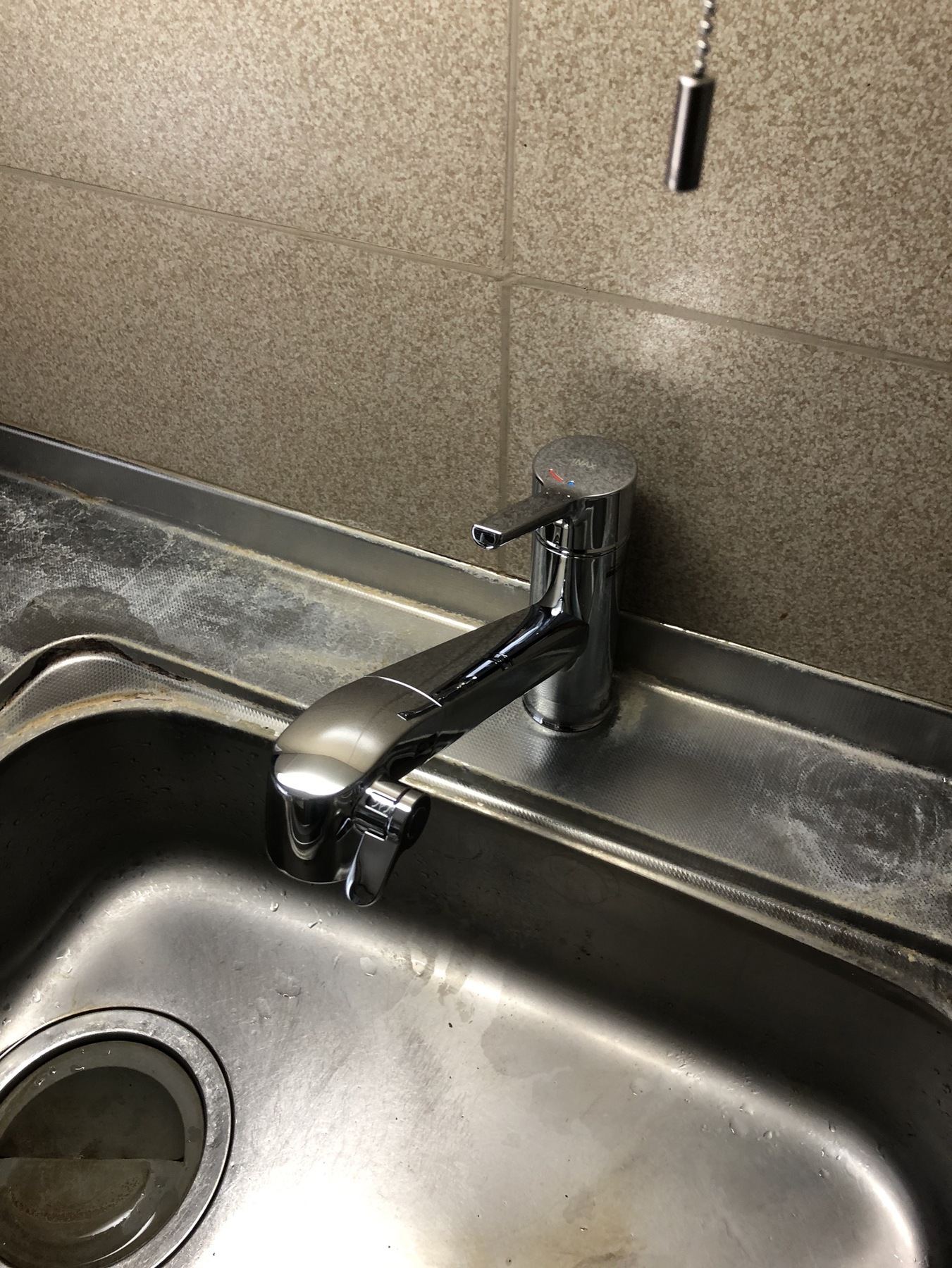 LIXIL　キッチン水栓　浄水器内臓　の写真