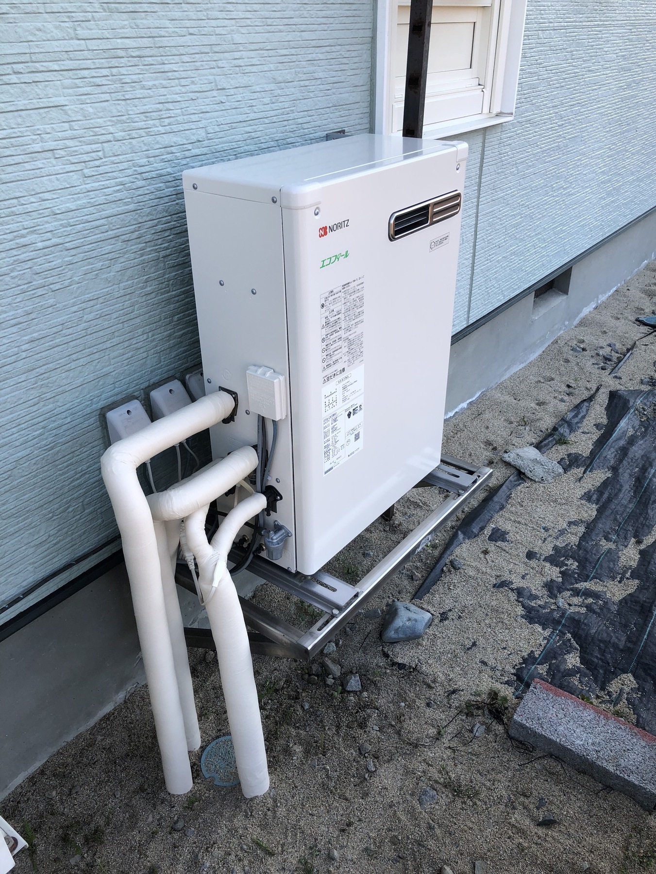 石油給湯器　トイレリフォームの写真